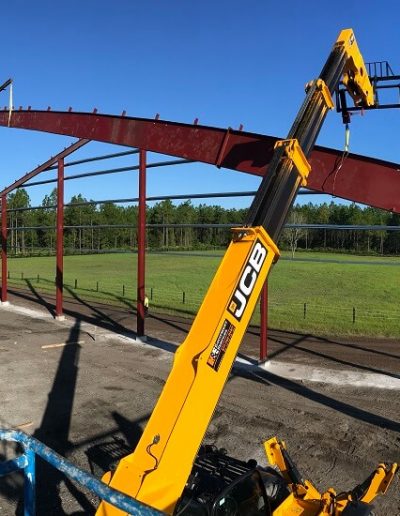 Installing Commercial Red Iron Steel Building Florida