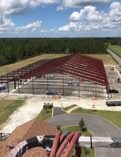 Erecting Red Iron Steel Building Florida