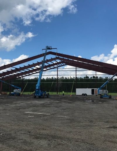 Installing Red iron Steel Building Florida