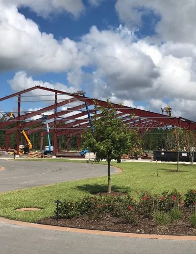 Red iron Metal Building Construction Florida